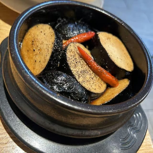 F1. Caramelized Fish in Clay Pot.